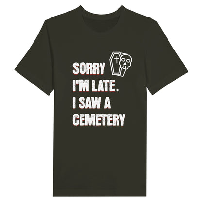 Bella Canvas 3001 T-Shirt with  the words Sorry I'm Late. I Saw A Cemetery in white and a small skull and coffin graphic to the top right of the text. Shirt is olive green