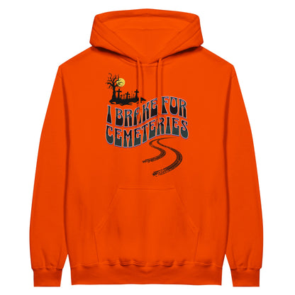 Gildan 18500 Hoodie Sweatshirt with the words I Brake For Cemeteries in black and grey with purples shading accents.. There are skid marks under the words and a small graveyard graphic to the top left of the words. The hoodie is orange.