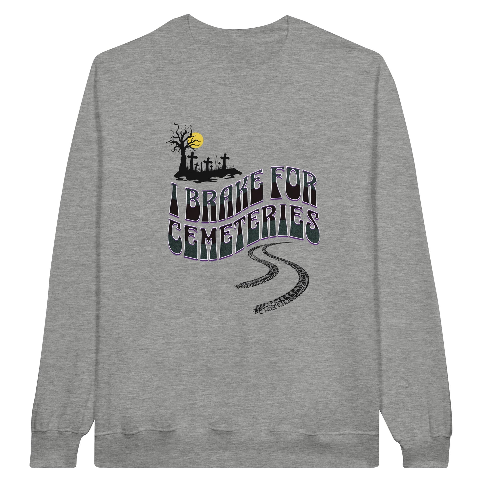 Gildan 18000 Crewneck Sweatshirt with the words I Brake For Cemeteries in black and grey with purples shading accents.. There are skid marks under the words and a small graveyard graphic to the top left of the words. The sweatshirt is heather grey