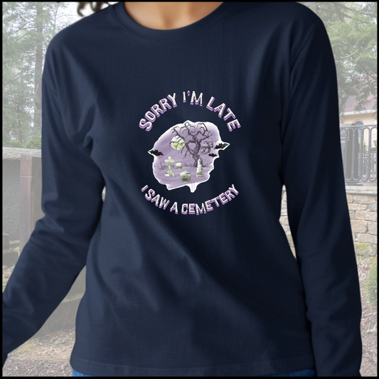 Bella Canvas 3501 Long Sleeve T-Shirt  with the words Sorry Im Late I saw a cemetery around a graphic of a cemetery.  Colors of the graphic are purple and grey. Shirt is navy blue.