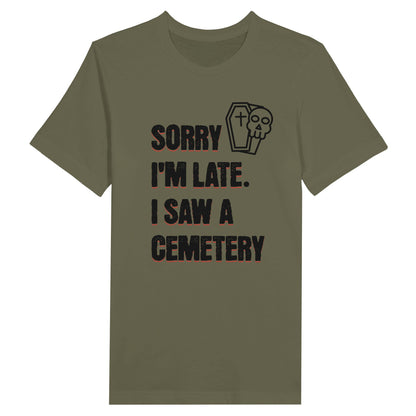 Bella Canvas 3001 T-Shirt with  the words Sorry I'm Late. I Saw A Cemetery in black and a small skull and coffin graphic to the top right of the text. Shirt is athletic grey.Bella Canvas 3001 T-Shirt with  the words Sorry I'm Late. I Saw A Cemetery in black and a small skull and coffin graphic to the top right of the text. Shirt is athletic military green